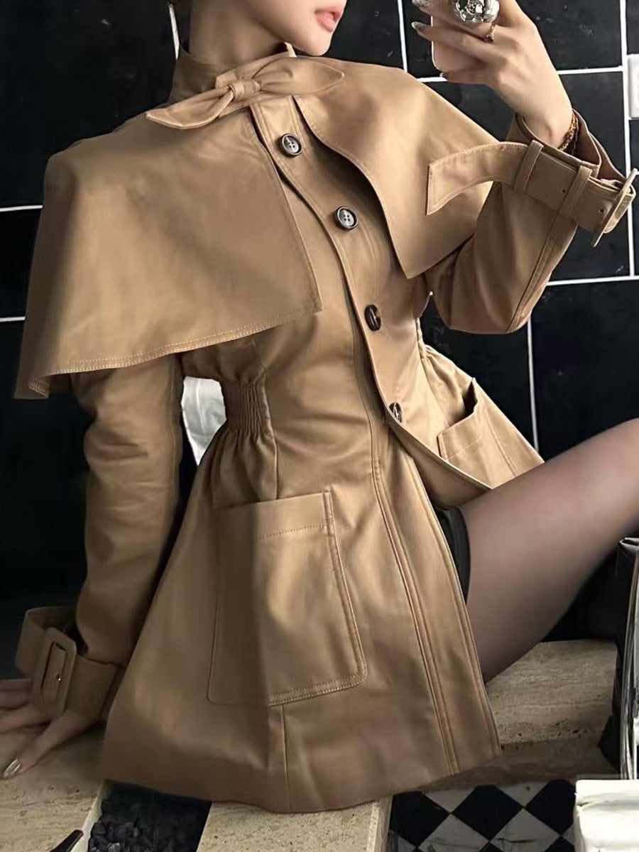 tailored coat with cape overlay and bow neckline – AMBER