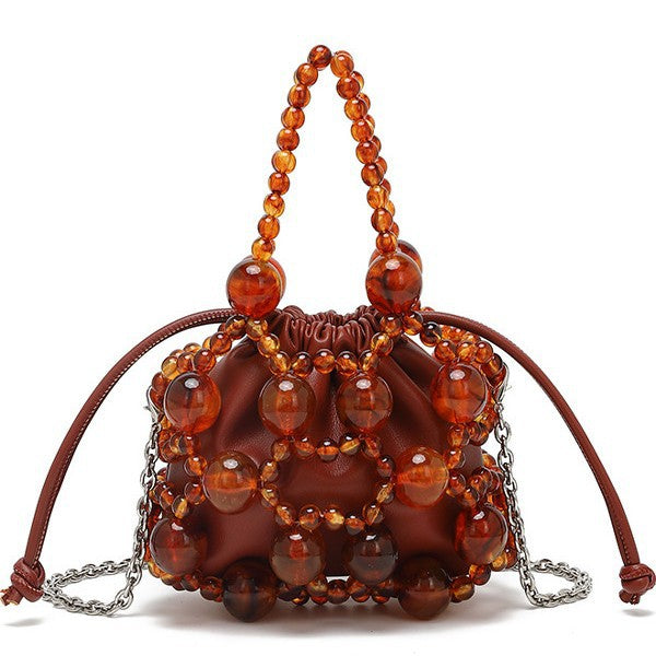 beaded mini drawstring bag with pearl handle – GEMMA
