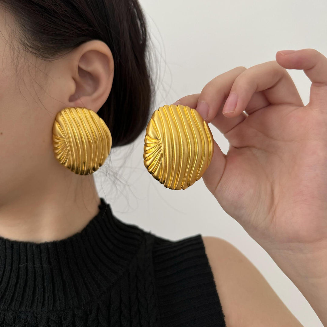 textured oval stud earrings with metallic finish - LYRANU