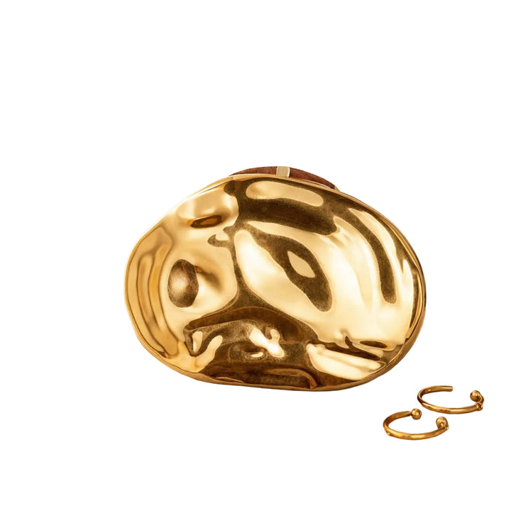 Abstract gold clutch with sculpted finish and chain strap – LIQUID
