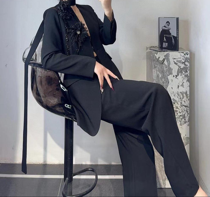 tailored wide-leg suit with floral shoulder accent – LIMEA