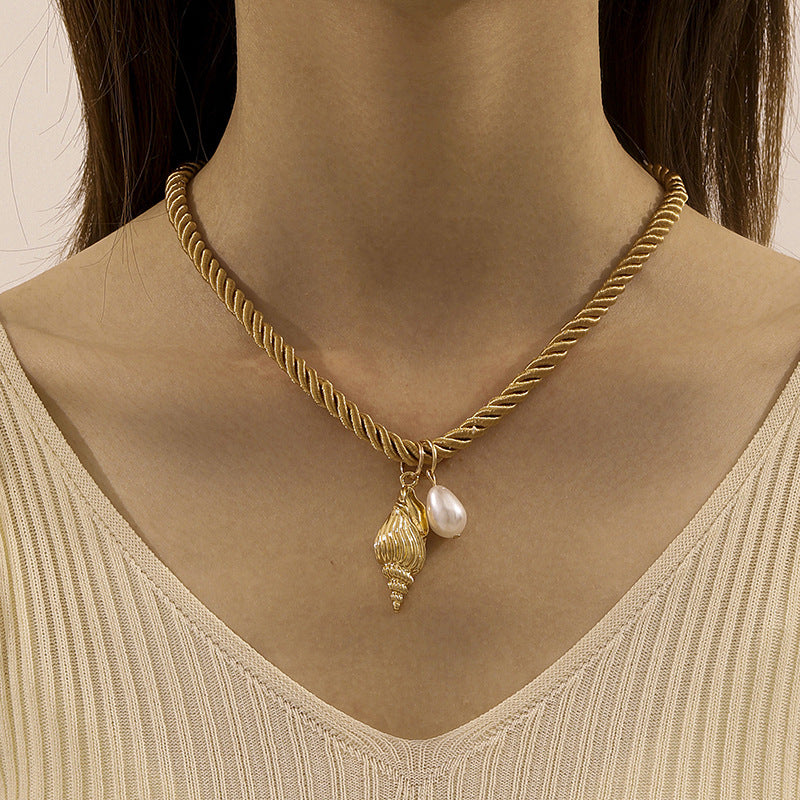 mouwloze uitlopende midi-jurk met kettingriem - CELIAV 