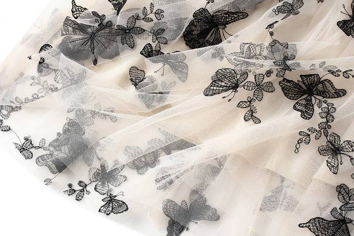 تنورة ميدي من التول مع طبقة خارجية مطرزة بفراشة – ماريبوسا