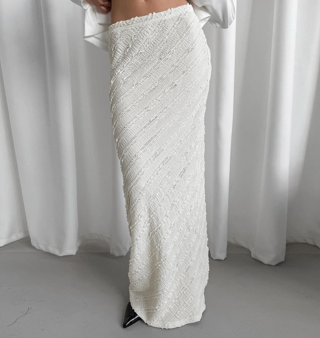 تنورة عمودية عالية الخصر بخطوط قطرية منقوشة – سيرينيلكي