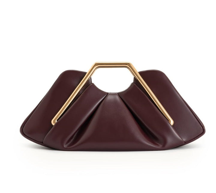 geometric leather clutch with sculptural gold handle – ZIAD