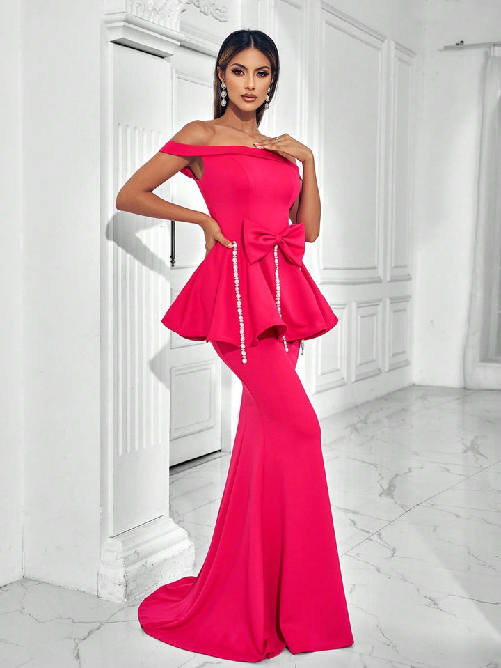 فستان ببلوم مكشوف الكتفين مع تفاصيل فيونكة على الخصر – فيوراكسا