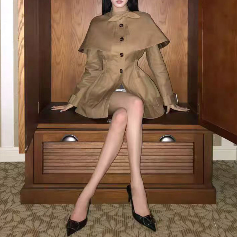 tailored coat with cape overlay and bow neckline – AMBER