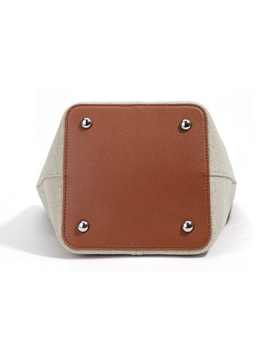 编织藤条手提包，配有双层皮革手柄 – LÉONIE 