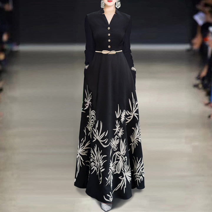 فستان ماكسي أسود بأكمام طويلة وتطريز بأوراق ذهبية – نوير بالم