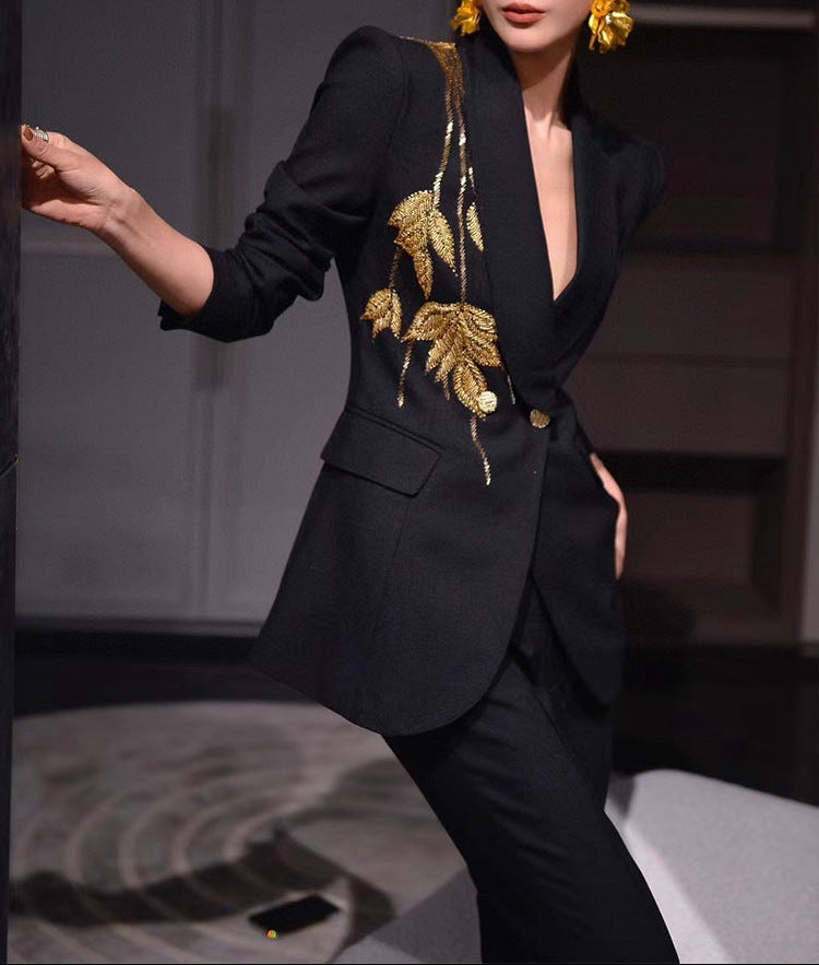 tailored flare pantsuit with structured peak lapels – AURORA