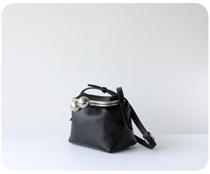 mini leather crossbody bag with metal frame clasp – YOUSF