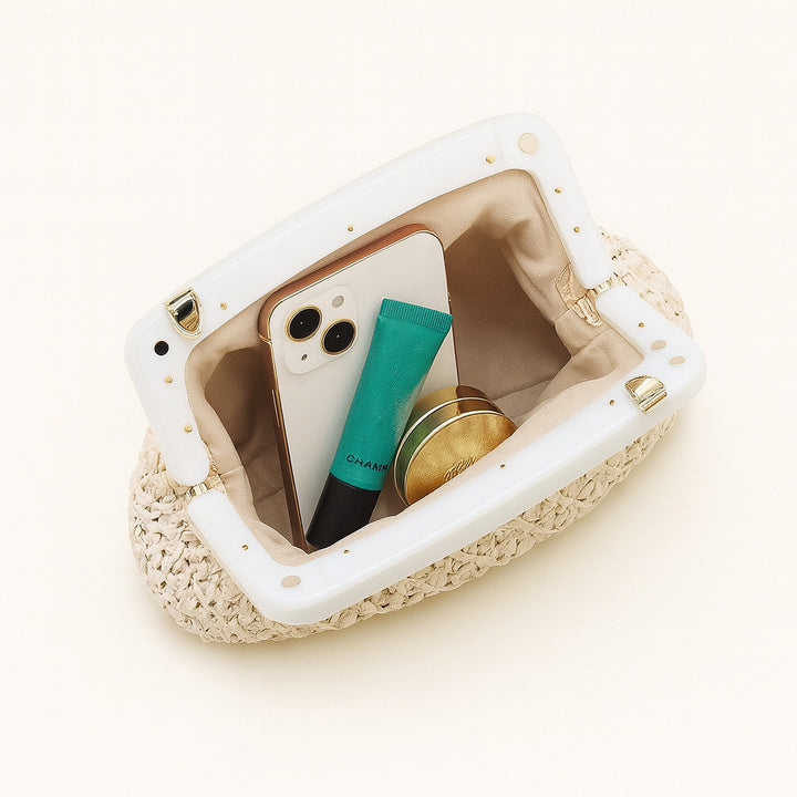 woven raffia clutch with resin frame – COASTA