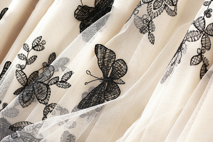 تنورة ميدي من التول مع طبقة خارجية مطرزة بفراشة – ماريبوسا