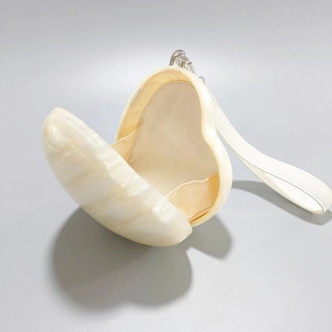 heart-shaped pearl acrylic clutch – AMOUR