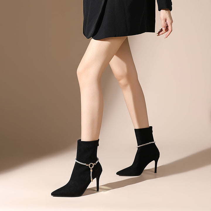 pointed-toe suede ankle boots with metallic ring detail – ARIADI