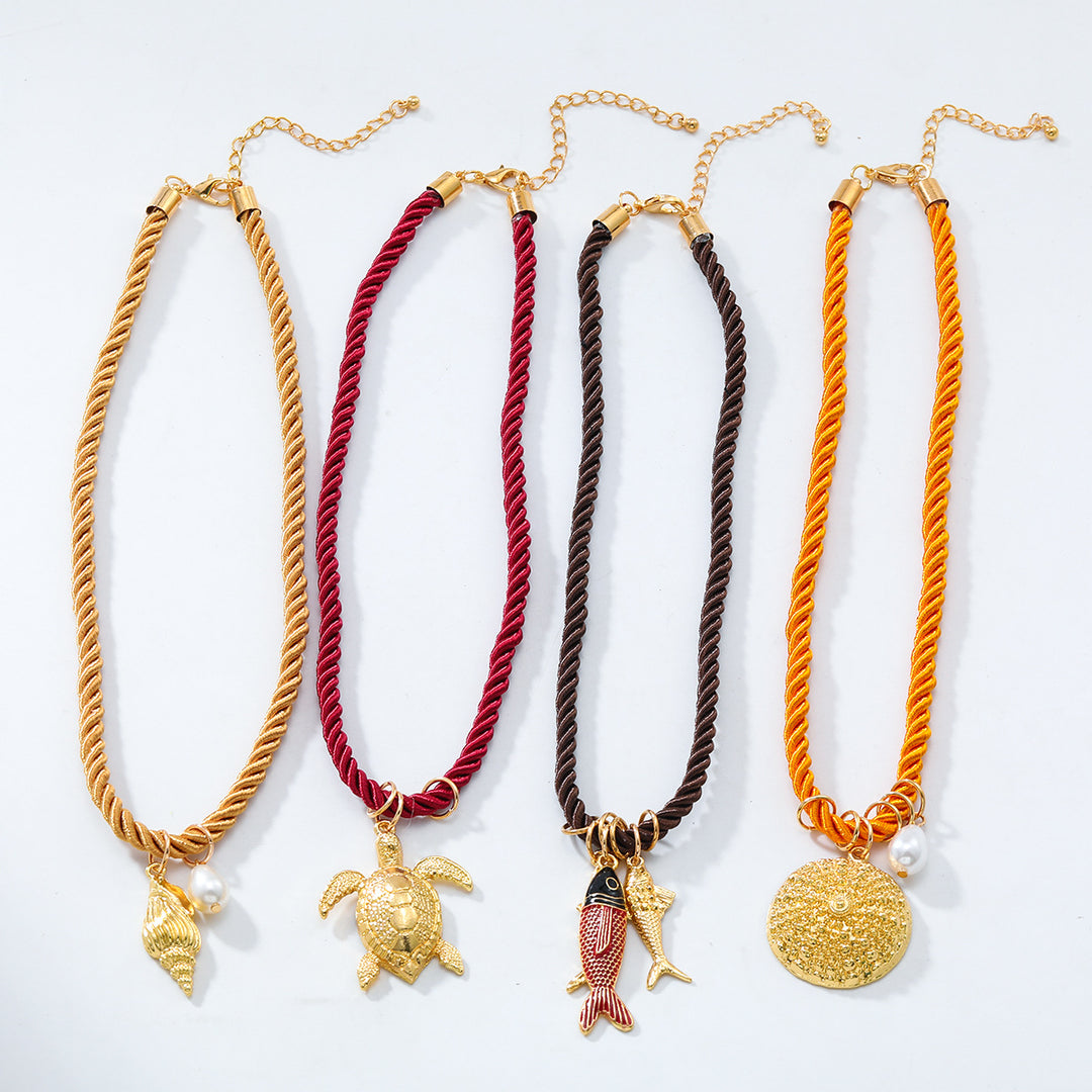 mouwloze uitlopende midi-jurk met kettingriem - CELIAV 