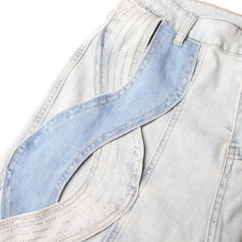 بنطلون جينز بقصات بلونين مع أجزاء بتصميم مموج - ريفيرا