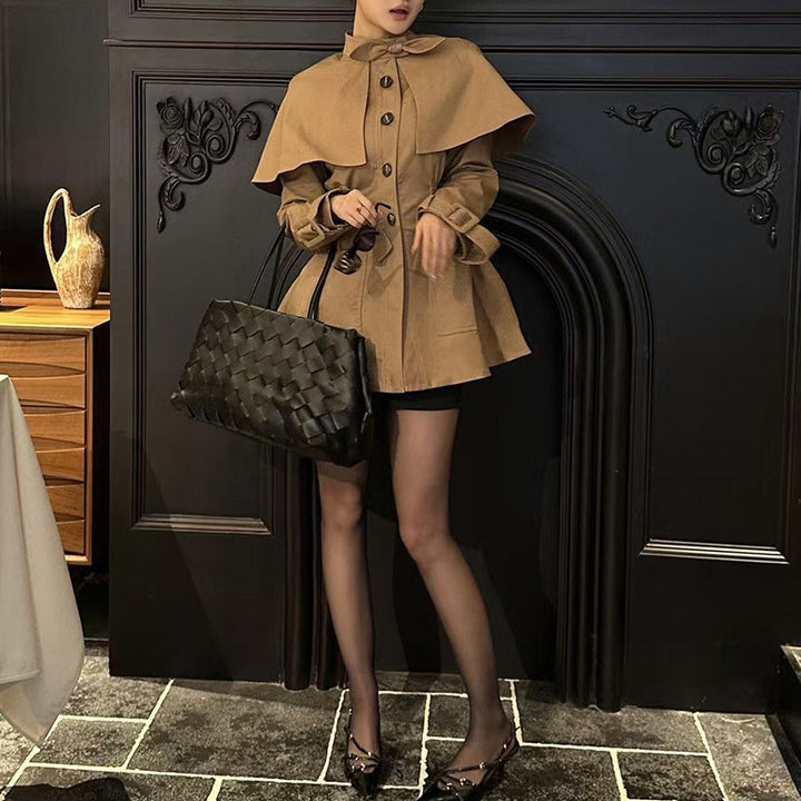 tailored coat with cape overlay and bow neckline – AMBER
