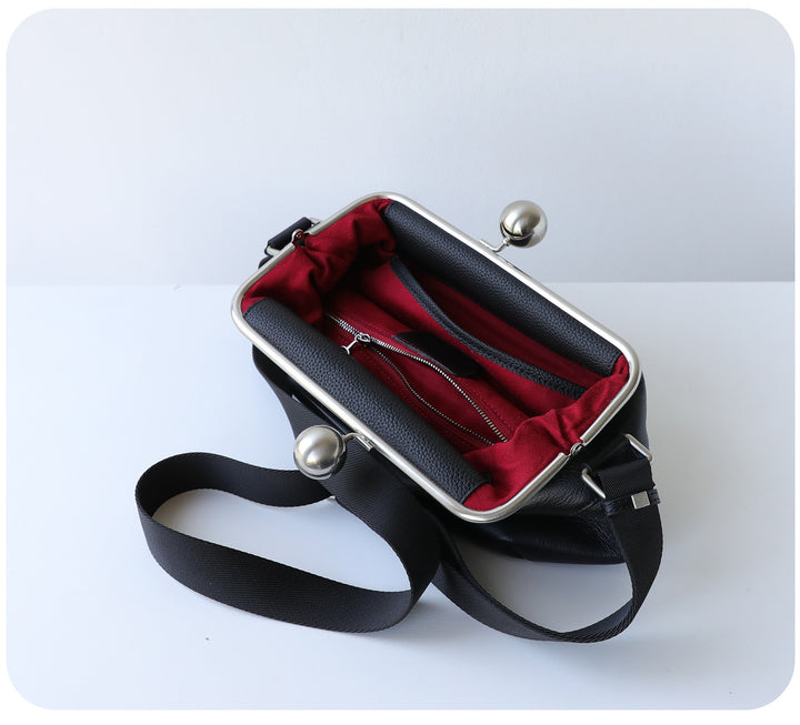mini leather crossbody bag with metal frame clasp – YOUSF