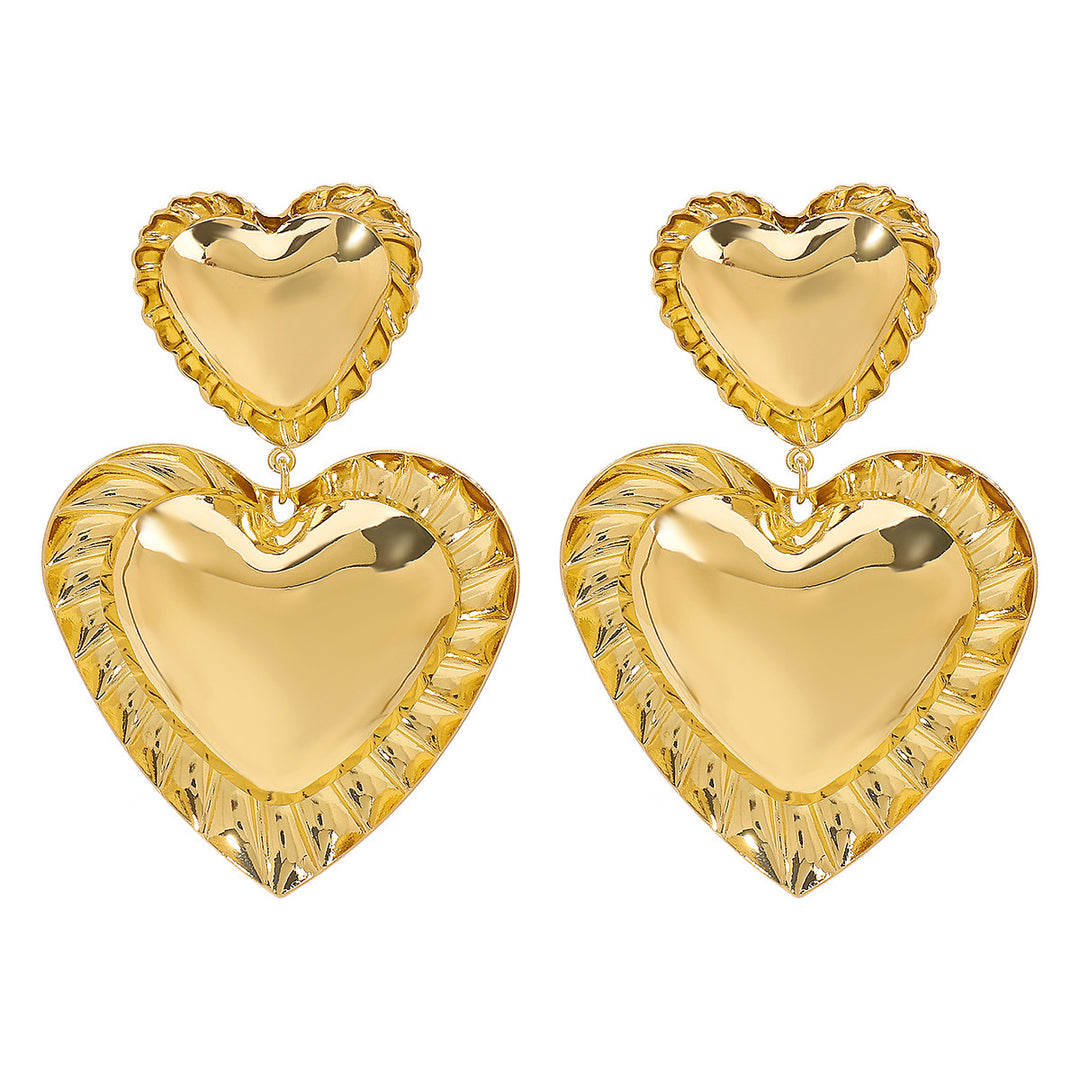 heart-shaped drop earrings with sculpted trim - CORAT