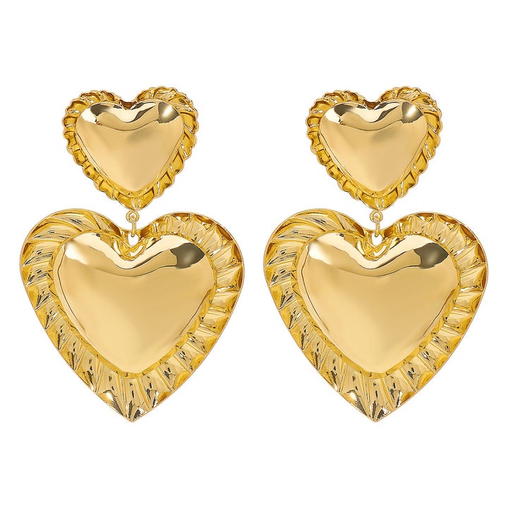 heart-shaped drop earrings with sculpted trim - CORAT