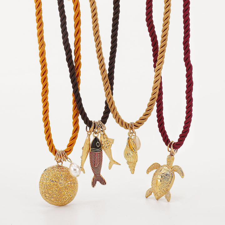 mouwloze uitlopende midi-jurk met kettingriem - CELIAV 