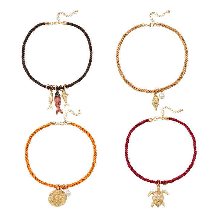 mouwloze uitlopende midi-jurk met kettingriem - CELIAV 