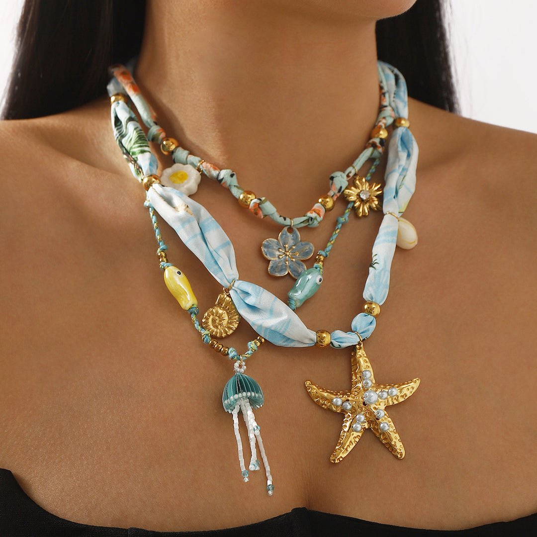 charm pendant necklace with silk and beaded accents – CORALIP