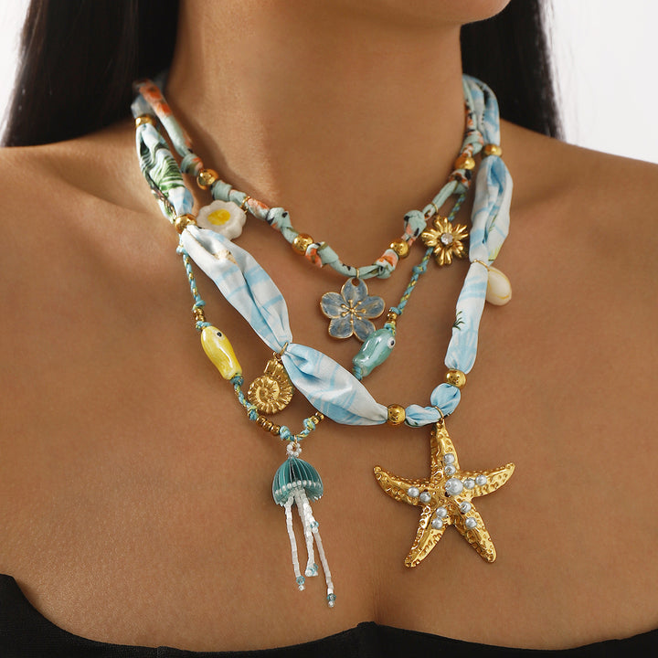 charm pendant necklace with silk and beaded accents – CORALIP