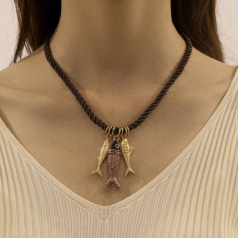 mouwloze uitlopende midi-jurk met kettingriem - CELIAV 