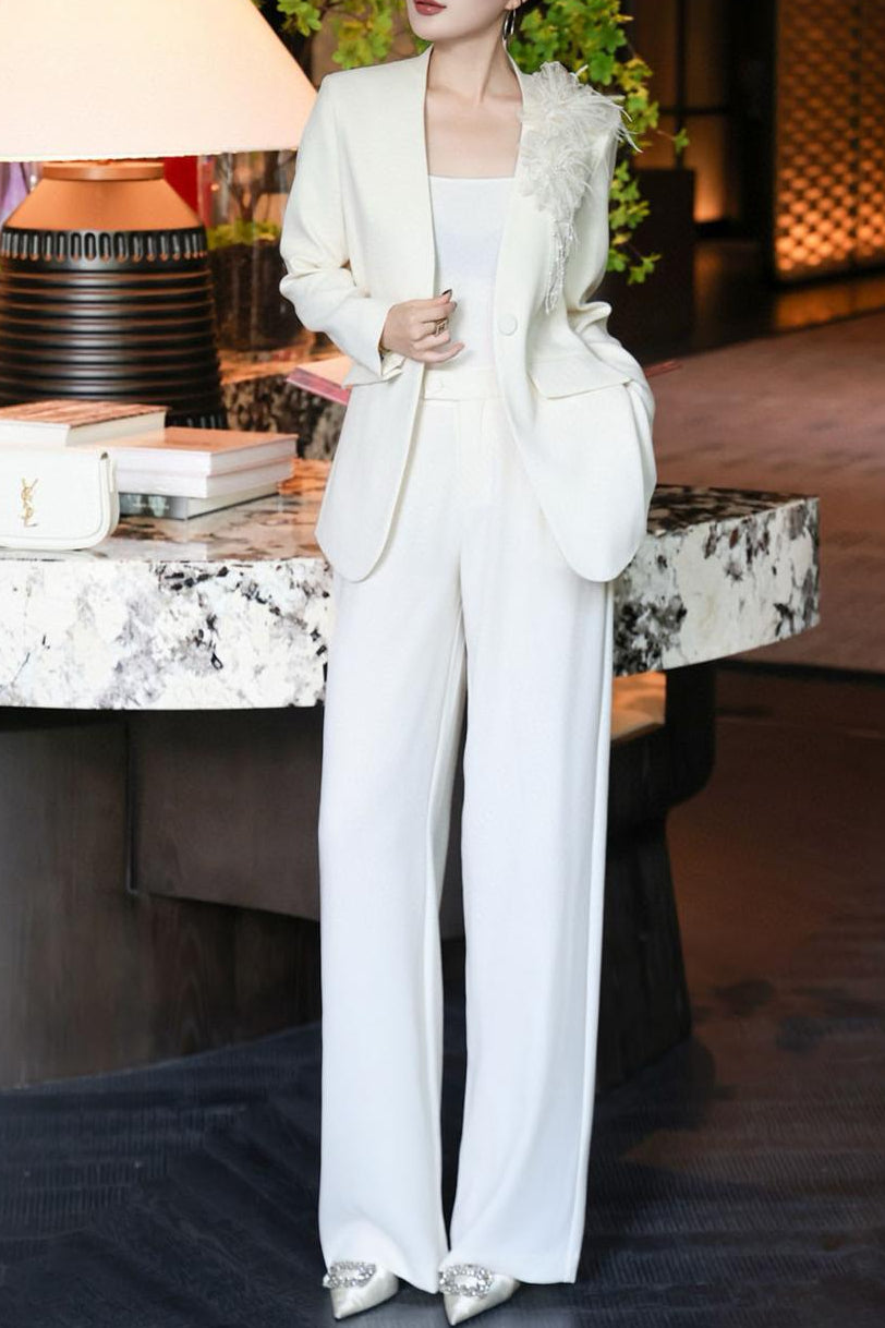 tailored wide-leg suit with floral shoulder accent – LIMEA