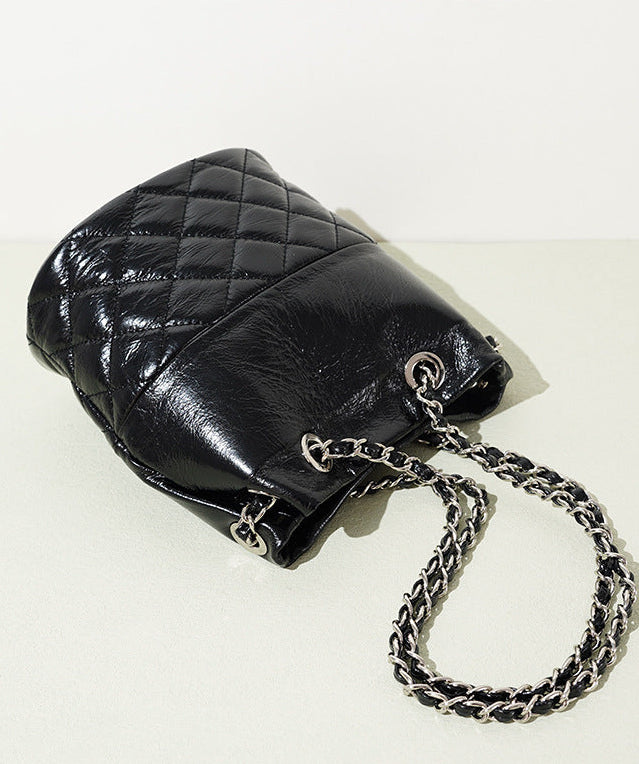 quilted metallic bucket bag with chain strap – AUMITRA