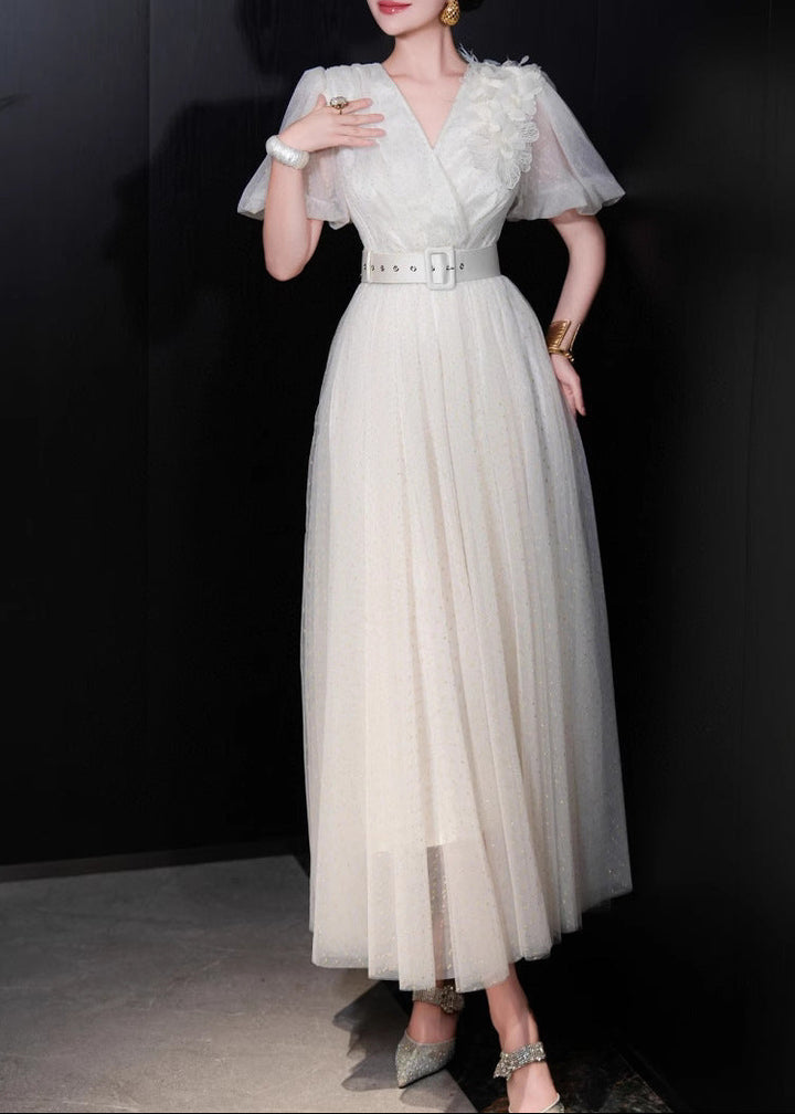 belted tulle wrap dress with flutter sleeves – ESMÉE