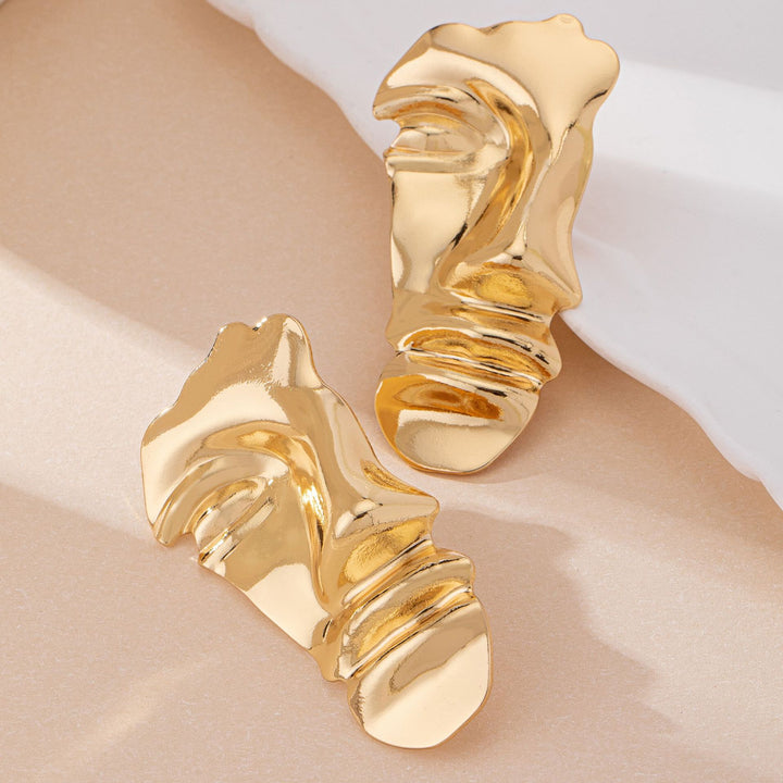 sculptural face-shaped earrings with abstract folds - Lerwa