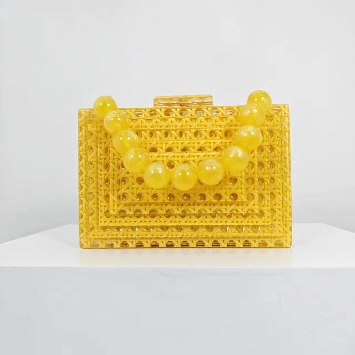 woven acrylic clutch with beaded handle – MARIGOLD