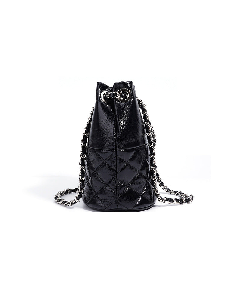 quilted metallic bucket bag with chain strap – AUMITRA