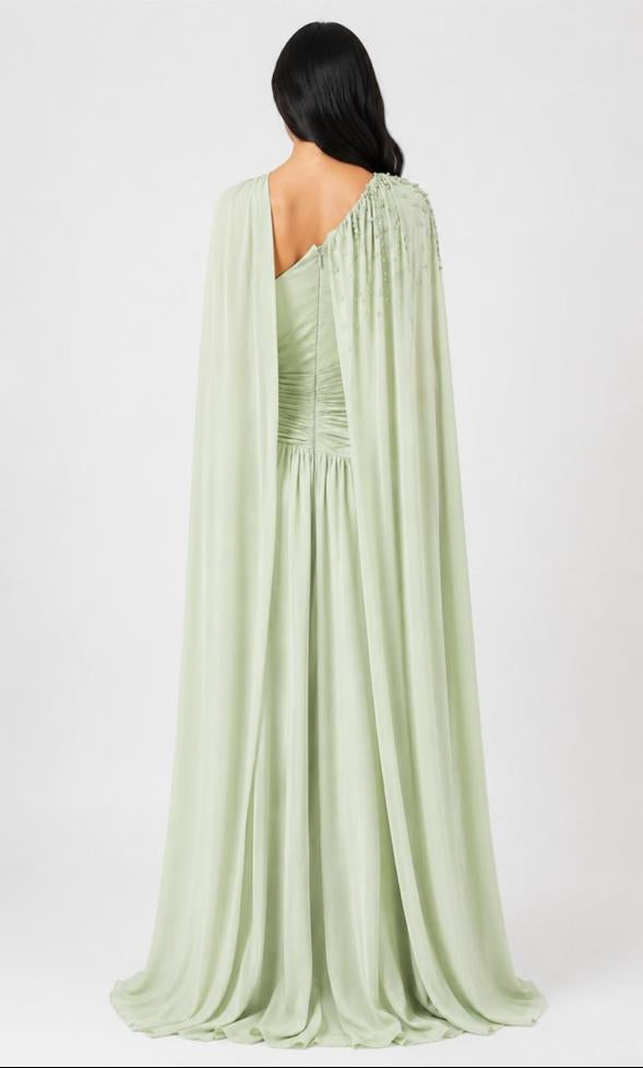 one-shoulder pleated gown with flowing chiffon cape – ODD- MINTARA