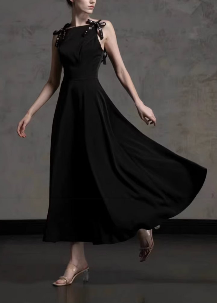 sleeveless flared dress with embellished bow straps – DELIIEN