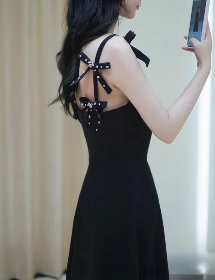 sleeveless flared dress with embellished bow straps – DELIIEN