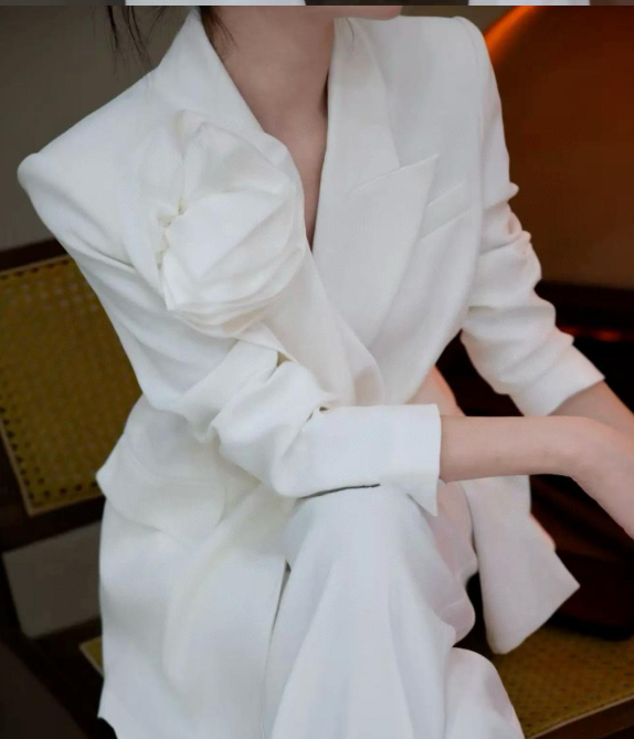 structured suit with oversized floral appliqué – PETAL