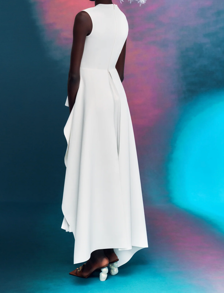 sleeveless peplum dress with layered pleated skirt – MARIGOLD