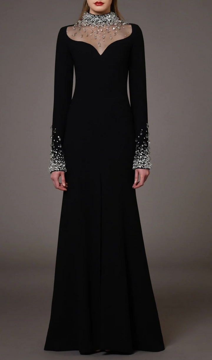 فستان سهرة طويل الأكمام بتصميم عمودي مع ياقة شفافة مرصعة بالكريستال - سيليست