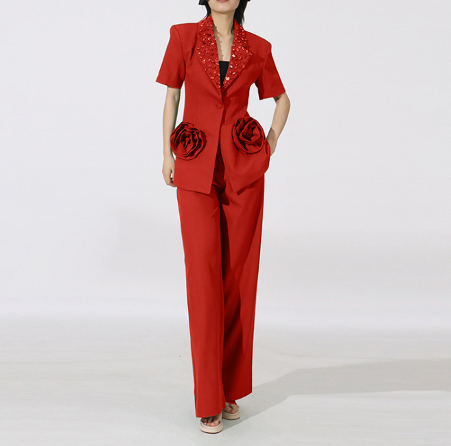 tailored blazer and wide-leg pants set with floral pockets – STATEMENT