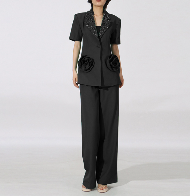 tailored blazer and wide-leg pants set with floral pockets – STATEMENT