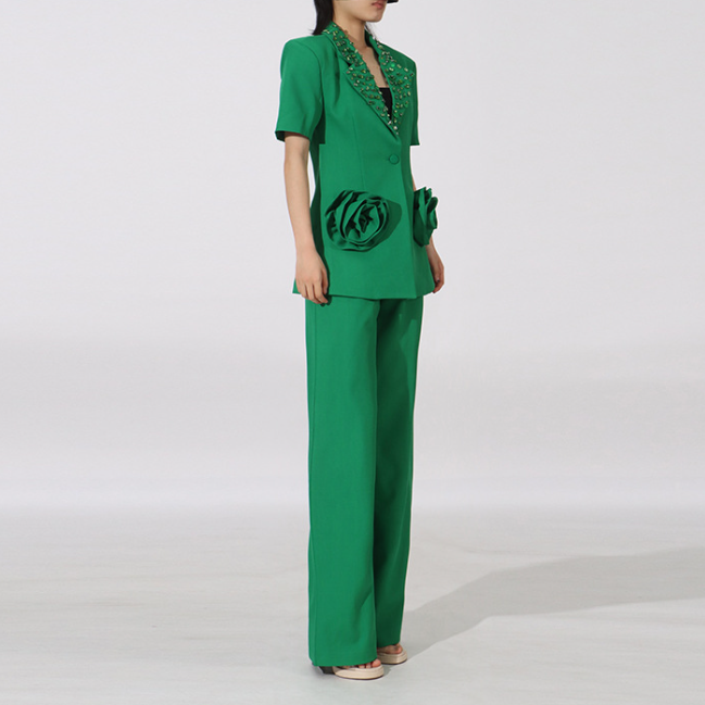 tailored blazer and wide-leg pants set with floral pockets – STATEMENT