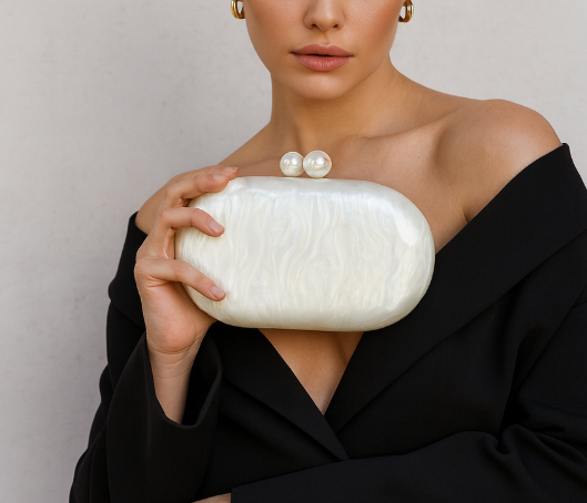 pearlescent oval clutch with pearl clasp – OPALINE