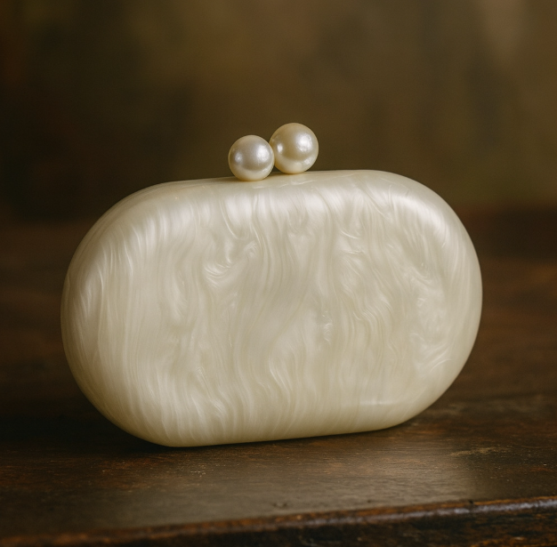 pearlescent oval clutch with pearl clasp – OPALINE
