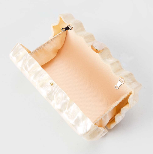 sculpted pearl-effect clutch with wave edges – ELYSIA