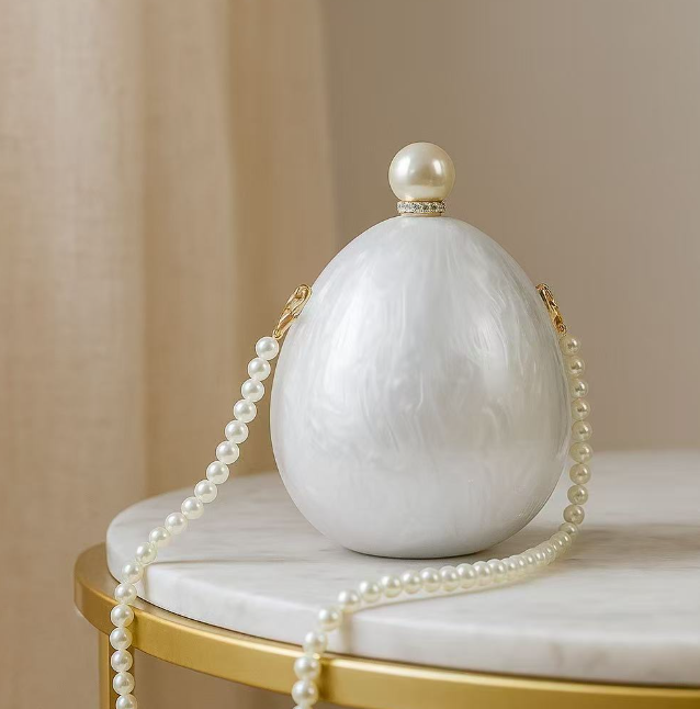 oval pearl-effect clutch with pearl strap – PERLA