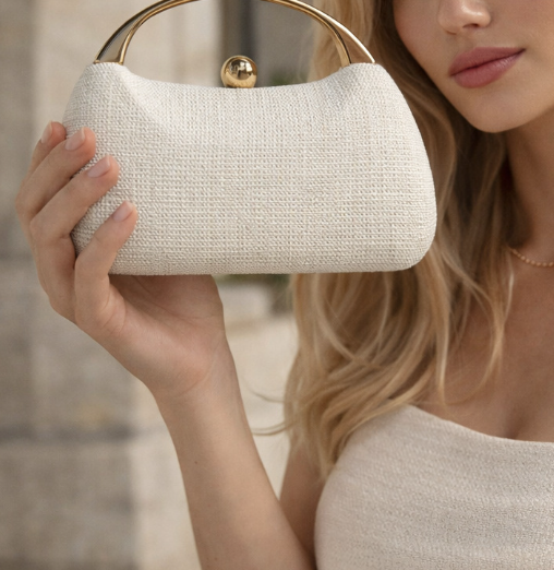 textured ivory handbag with gold arch handle – ELARA